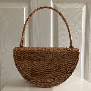 Anthropologie Rattan half circle handbag